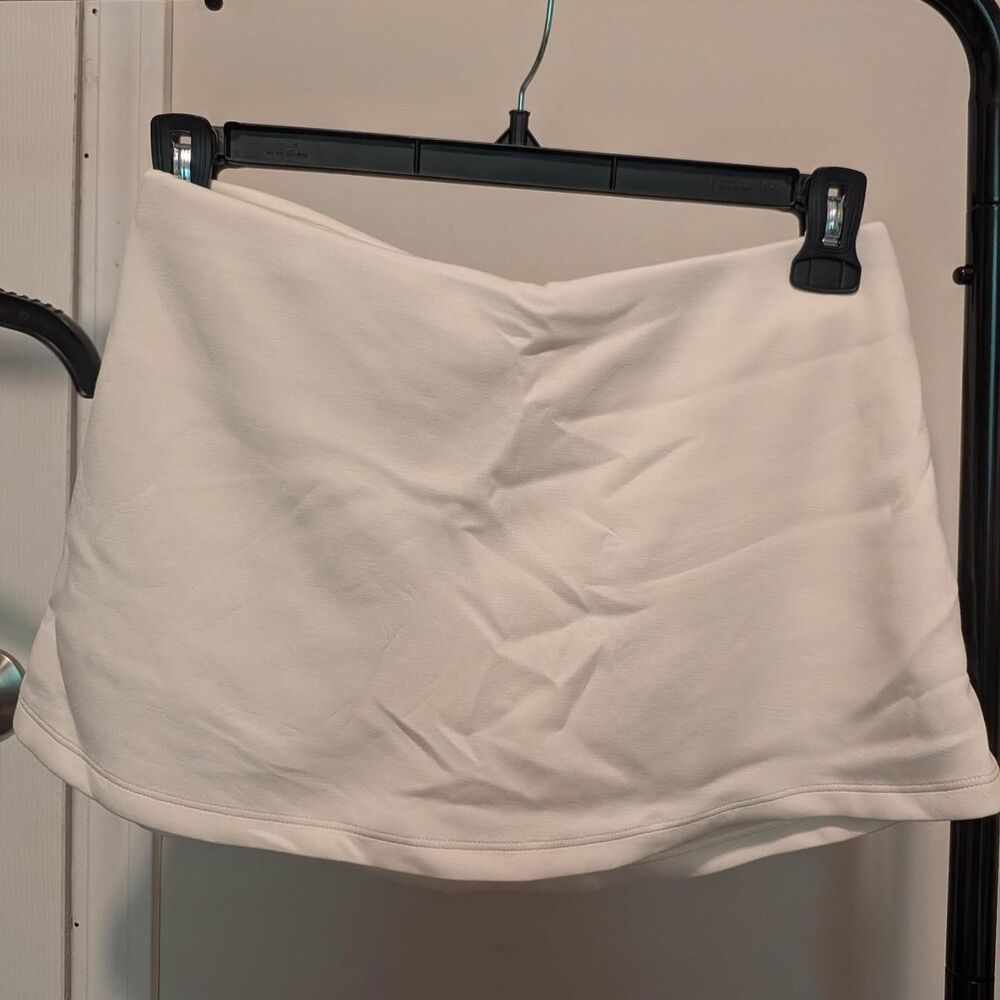 White buttery soft mini skirt with built in shorts